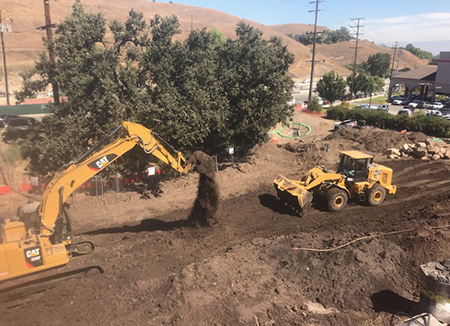 Photo Of An Edmondson Construction Excavator And Dozer At The Jobsite We Move Dirt
